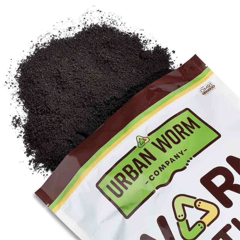 Close-up of Urban Worm Company organic worm castings showing their fine texture and nutrient-rich soil amendment for healthier plants and living soil.