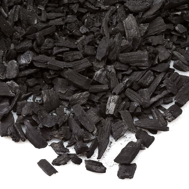 Close-up of Urban Worm Biochar showing porous carbon-rich pieces that improve soil health, microbial activity, and nutrient retention.