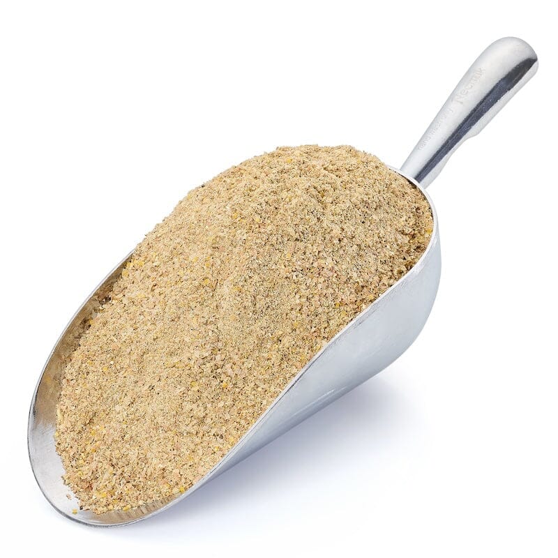 Metal scoop filled with Urban Worm Chow, a protein-rich supplemental food for composting worms that promotes healthy worm growth, vermicomposting, and organic compost production.