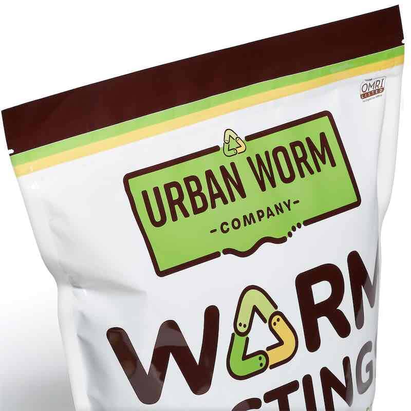 Close-up of the Urban Worm Company Worm Castings package featuring the brand logo and OMRI Listed certification for organic gardening and soil health.